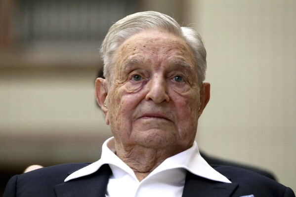 FILE - George Soros, Founder and Chairman of the Open Society Foundations, looks before the Joseph A. Schumpeter award ceremony in Vienna, Austria, June 21, 2019. Soros' Open Society Foundations announced a leadership change Monday, March 11, 2024 with its president Mark Malloch-Brown stepping down and a senior leader, Binaifer Nowrojee, appointed to the role. (AP Photo/Ronald Zak, File)