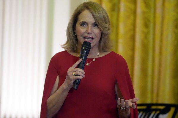 Katie Couric speaks before President Joe Biden at an event to honor veterans and their families, one day before the 83rd anniversary of the attack on Pearl Harbor, in the East Room at the White House in Washington, Friday, Dec. 6, 2024. (AP Photo/Mark Schiefelbein)