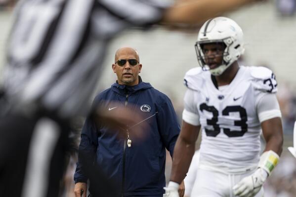 Penn State coach James Franklin talks to defensive end Dani Dennis-Sutton during the second quarter of the NCAA college football team's Blue-White spring game Saturday, April 15, 2023, in State College, Pa. (Joe Hermitt/The Patriot-News via AP)