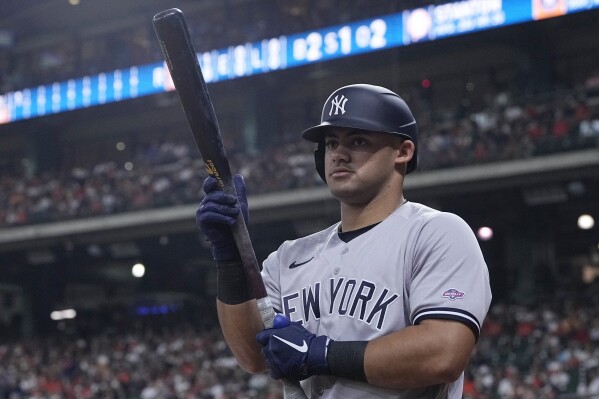 New York Yankees' Jasson Dominguez, making his debut in the majors, stands on-deck before batting against the Houston Astros during the first inning of a baseball game Friday, Sept. 1, 2023, in Houston. (AP Photo/Kevin M. Cox)