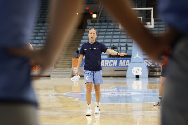 Columbia head coach Megan Griffith talks to her team at practice in Chapel Hill, N.C., Wednesday, March 19, 2025, before their First Four basketball game in the NCAA Tournament against Washington on March 20. (AP Photo/Nell Redmond)