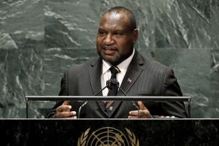 FILE - Prime Minister of Papua New Guinea James Marape addresses the 76th session of the United Nations General Assembly, on Sept. 24, 2021, at the UN headquarters. Police shot a young mother dead at a polling station in the Papua New Guinea capital, Port Moresby, in the latest violence to mar national elections, according to a local media report on Friday, July 15, 2022. (Peter Foley/Pool Photo via AP, File)
