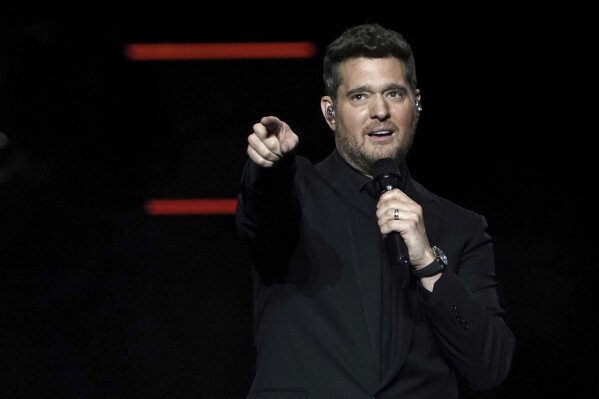 Michael Buble performs on stage at the O2 Arena in London, Sunday, Mar. 26, 2022. (Photo by Scott Garfitt/Invision/AP, file)