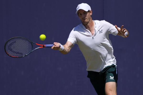 Andy Murray of Britain plays a shot during a practice session at the Queens Club tennis tournament in London, Monday, June 14, 2021. (AP Photo/Kirsty Wigglesworth)