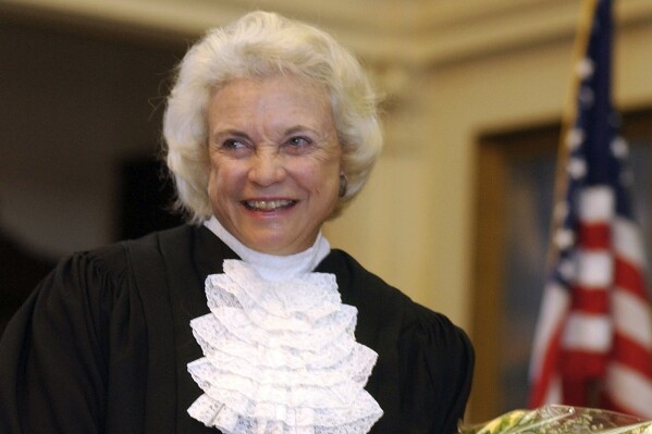 FILE - Supreme Court Justice Sandra Day O'Connor is shown before administering the oath of office to members of the Texas Supreme Court in Austin, Texas, on Jan. 6, 2003. The late Justice Sandra Day O'Connor, the first woman to serve on the Supreme Court and an unwavering voice of moderate conservatism for more than two decades, will lie in repose in the court's Great Hall on Monday, Dec. 18, 2023. (AP Photo/Harry Cabluck, File )
