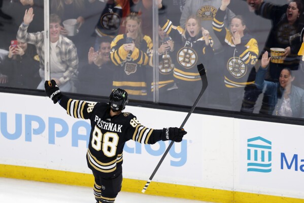 Bruins beat Devils 2-1, match NHL record with 62nd win – New York