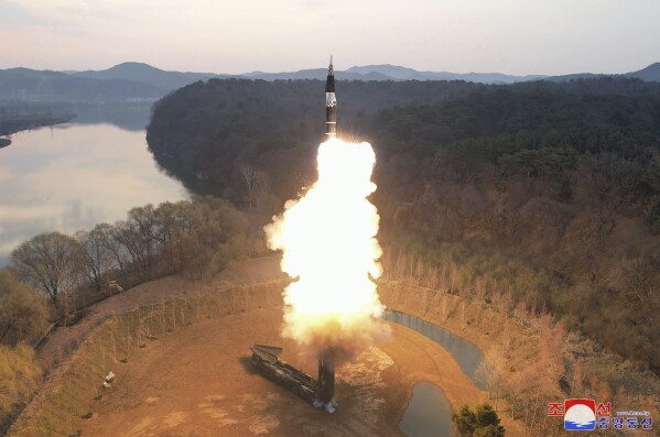 This photo provided by the North Korean government shows the test-fire of what they call an intermediate-range ballistic missile on the outskirts of Pyongyang, North Korea Tuesday, April 2, 2024. Independent journalists were not given access to cover the event depicted in this image distributed by the North Korean government. The content of this image is as provided and cannot be independently verified. Korean language watermark on image as provided by source reads: "KCNA" which is the abbreviation for Korean Central News Agency. (Korean Central News Agency/Korea News Service via AP)