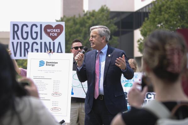 Del. Rip Sullivan, D-Arlington, speaks at a rally Wednesday, June 7, 2023, in Richmond, Va., ahead of the State Air Pollution Control Board's vote on withdrawing Virginia from the Regional Greenhouse Gas Initiative. (Charlotte Rene Woods/Richmond Times-Dispatch via AP)