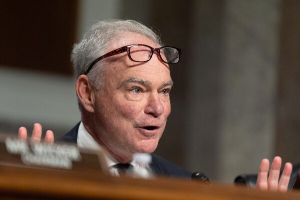 Senate Armed Services Committee ranking member Tim Caine, D-Va., question witnesses Vice Chief of Naval Operations Adm. James Kilby; Secretary of the Navy John Phelan and Commandant of the Marine Corps Gen. Eric Smith, during a hearing to examine the posture of the Department of the Navy in review of the Defense Authorization Request for Fiscal Year 2026 and the Future Years Defense Program on Capitol Hill, Tuesday, June 10, 2025, in Washington. (AP Photo/Manuel Balce Ceneta)