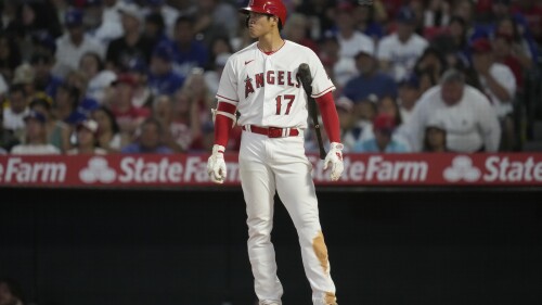 Los Angeles Angels' Shohei Ohtani (17) waits to bat during the sixth inning of a baseball game against the Los Angeles Dodgers in Anaheim, Calif., Wednesday, June 21, 2023. (AP Photo/Ashley Landis)