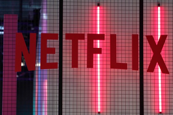 FILE- In this Nov. 4, 2017, file photo, the logo of entertainment company Netflix is pictured in Paris. (AP Photo/Christophe Ena, File)