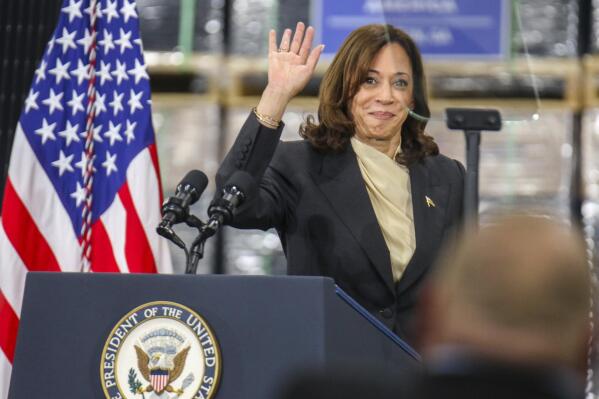 Vice President Kamala Harris waves to the audience during her visit to the Qcells solar plant in Dalton, Ga. Thursday, April 6, 2023. (Olivia Ross/Chattanooga Times Free Press via AP)