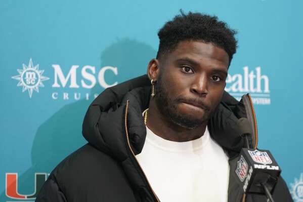 Miami Dolphins wide receiver Tyreek Hill speaks at a news conference after an NFL wild-card playoff football game against the Kansas City Chiefs Saturday, Jan. 13, 2024, in Kansas City, Mo. (AP Photo/Ed Zurga)