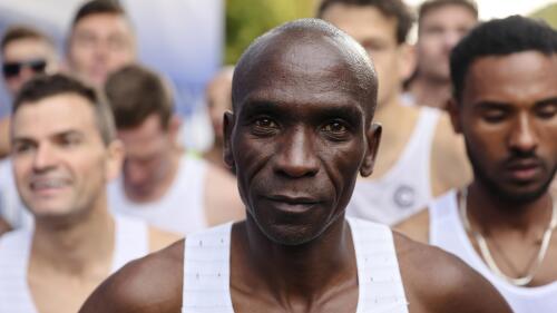 FILE - Eliud Kipchoge, center, waits for the start of the Berlin Marathon in Berlin, Germany, Sunday, Sept. 25, 2022. Kenyan marathon specialist Eliud Kipchoge has won the Princess of Asturias Award for sports for 2023 it was announced on Thursday May 18, 2023. The Spanish foundation that organizes the prizes said that Kipchoge, holder two Olympic gold medals for the marathon, is a legend in world athletics and the best marathon runner of all time. The awards are given out in a ceremony in October. (AP Photo/Christoph Soeder, File)
