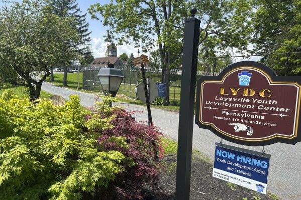 The entrance to the state-run Loysville Youth Development Center in Loysville, Pa., is seen on Monday, May 20, 2024. A set of newly filed lawsuits claims children who were sent to juvenile detention centers in Pennsylvania, including Loysville, suffered a range of sexual abuse, including violent rapes. (AP Photo/Mark Scolforo)