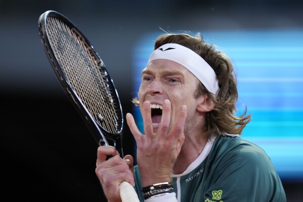 Andrei Rublev of Russia reacts during the final match against Felix Auger-Aliassime of Canada at the Madrid Open tennis tournament in Madrid, Spain, Sunday, May 5, 2024. (AP Photo/Manu Fernandes) )
