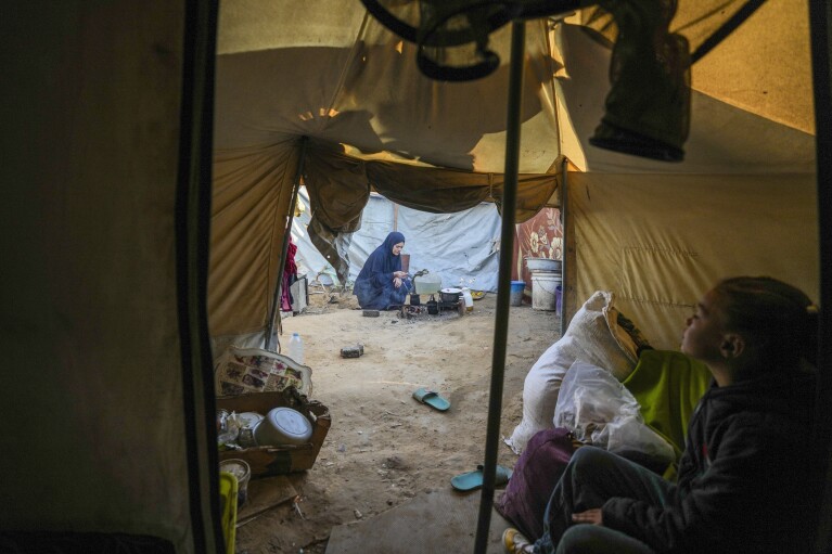 In Gaza’s crowded tent camps, girls strive against with a existence stripped of privateness