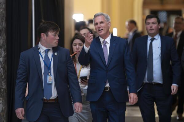 Speaker of the House Kevin McCarthy, R-Calif., walks from the chamber just after the Republican majority in the House narrowly passed a sweeping debt ceiling package as they try to push President Joe Biden into negotiations on federal spending, at the Capitol in Washington, Wednesday, April 26, 2023. (AP Photo/J. Scott Applewhite)