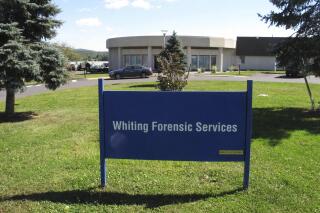 FILE — The Whiting Forensic Division maximum-security psychiatric hospital, in Middletown, Conn., is shown in this photo, Sept. 15, 2017. A Connecticut judge has approved a $9-million settlement between the state and the brother of a man who was abused numerous times at the state's maximum-security psychiatric hospital, lawyers in the case announced Thursday, June 30, 2022. (AP Photo/Dave Collins, File)