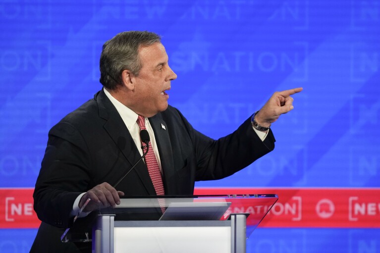 Republican presidential candidate former New Jersey Gov. Chris Christie, gesturing towards businessman Vivek Ramaswamy during a Republican presidential primary debate hosted by NewsNation on Wednesday, Dec. 6, 2023, at the Moody Music Hall at the University of Alabama in Tuscaloosa, Ala. (AP Photo/Gerald Herbert)