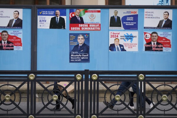 Election posters of all Azerbaijani presidential candidates are displayed in Baku, Azerbaijan, Monday, Feb. 5, 2024. Azerbaijan will hold presidential elections on Wednesday, Feb. 7, 2024. (AP Photo/Sergei Grits)