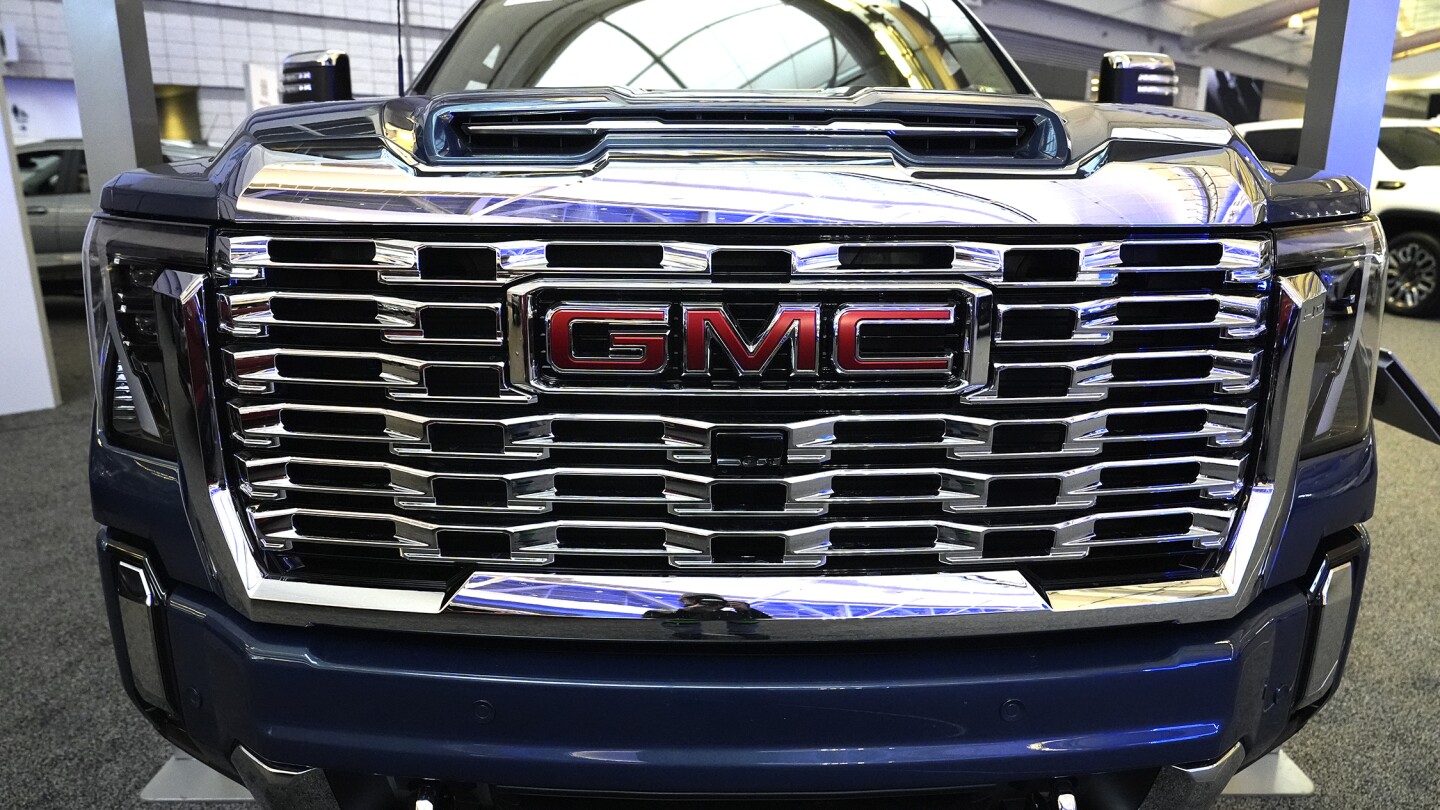 Shares of GM and other automakers slump following Trump tariffs, with Tesla the exception