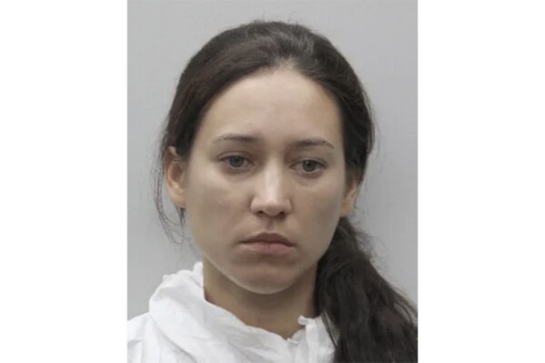 This Aug. 6, 2018, photo released by Fairfax County Police Department shows Veronica Youngblood. Youngblood was convicted of fatally shooting her two children in 2018. and was scheduled for sentencing on Thursday, September 21, 2023. When officers arrived, they discovered two juvenile victims in an apartment. (Fairfax County Police Department via AP)