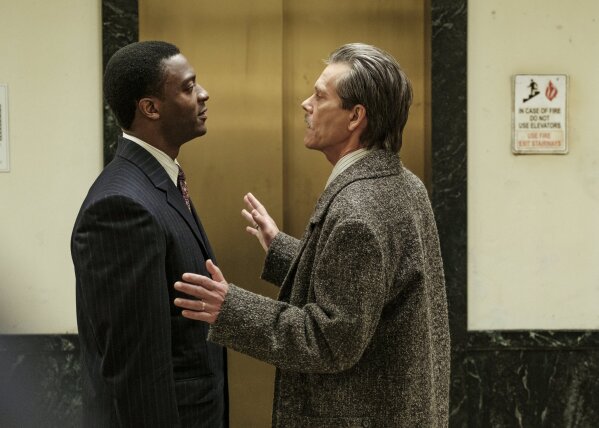 This image released by Showtime shows Aldis Hodge, left, and Kevin Bacon in the series "City on a Hill," premiering Sunday. (Francisco Roman/Showtime via AP)