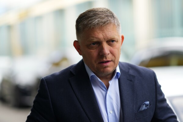 FILE - Chairman of SMER-Social Democracy party Robert Fico arrives at his party's headquarters in Bratislava, Slovakia, Sunday, Oct. 1, 2023 the day after an early parliamentary election. On Monday Oct. 30, 2023, the new Slovak Prime Minister Robert Fico announced a 