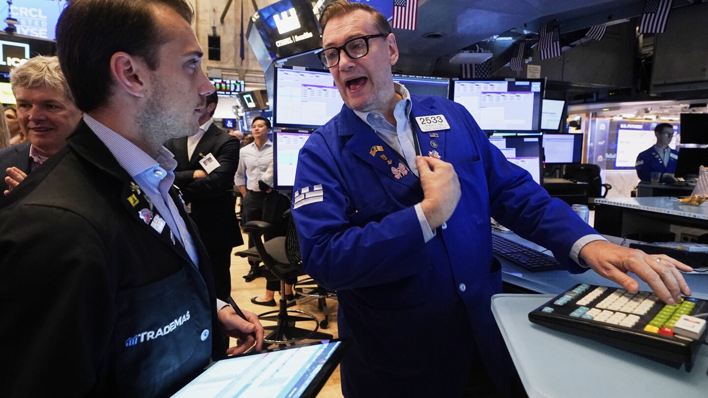 Wall Street gains ground following a solid jobs report and marks another winning week