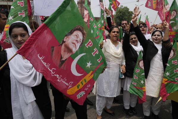 Lawyers, who support Pakistan's former Prime Minister Imran Khan, hold a protest against Khan's imprisonment, in Lahore, Pakistan, Monday, Aug. 7, 2023. Khan is now an inmate at a high-security prison after being convicted of corruption and sentenced to three years. (AP Photo/K.M. Chaudary)