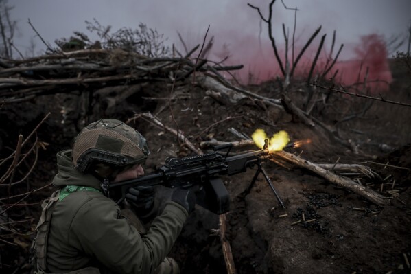 In this photo provided by Ukraine's 24th Mechanised Brigade press service, a serviceman of the 24th Mechanised Brigade improves his tactical skills at the training field in Donetsk region, Ukraine, Friday, Nov. 29, 2024. (Oleg Petrasiuk/Ukrainian 24th Mechanised Brigade via AP)