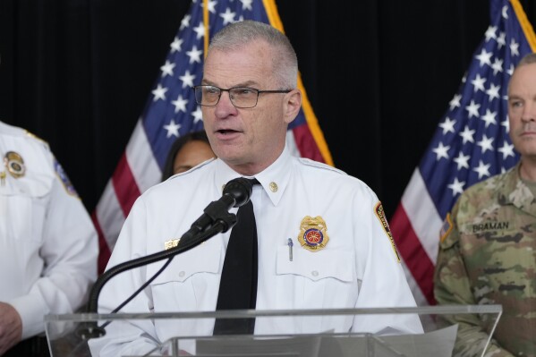 D.C. Fire and EMS Chief John Donnelly speaks during a news conference at Ronald Reagan Washington National Airport, Friday, Jan. 31, 2025, in Arlington, Va. (AP Photo/Alex Brandon)