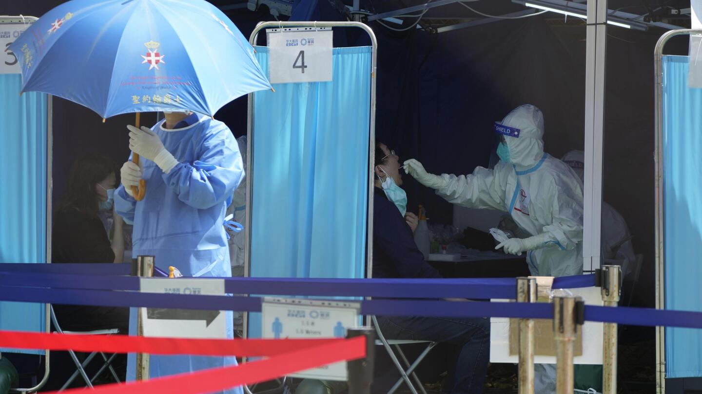 Hong Kong scraps vaccine pass, COVID-19 tests for travelers