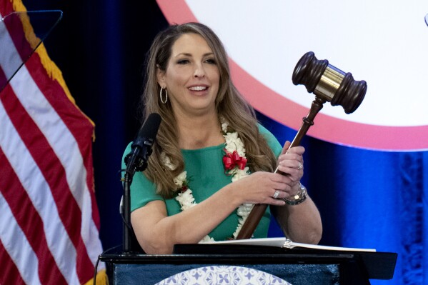 FILE - Republican National Committee Chair Ronna McDaniel holds a gavel while speaking at the committee's winter meeting in Dana Point, Calif., Jan. 27, 2023. McDaniel has discussed leaving her role with former President Donald Trump. But both have agreed to delay a decision until after South Carolina’s Feb. 24 primary. (AP Photo/Jae C. Hong, File)
