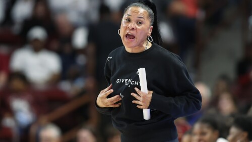 FILE - South Carolina coach Dawn Staley argues with a referee during the second half of the team's NCAA college basketball game against Florida in Columbia, S.C., Thursday, Feb. 16, 2023. South Carolina's latest group of newcomers has a huge, some might say impossible, task ahead _ keeping the Gamecocks among the game's best after the loss of their generational class that included All-Americans Aliyah Boston and Zia Cooke. (AP Photo/Nell Redmond, File)