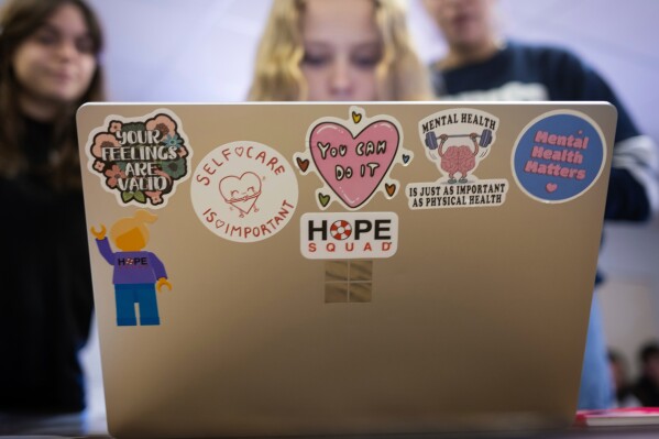 This image provided by Idaho Education News shows students planning out activities for Hope Week during a Hope Squad class at Rigby High School in Rigby, Idaho on Wednesday, Feb. 5, 2025. (John Roark/Idaho Education News via AP)