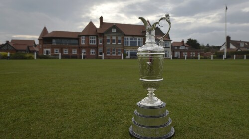 FILE - The British Open Golf trophy, the "Claret Jug" is displayed by the clubhouse at the Royal Liverpool Golf Club before the British Open golf championships, Hoylake, England, Wednesday, April 22, 2014. Golf’s major championship season comes to a close at the British Open. It's the last chance of the year for Rory McIlroy to end his nine-year drought in the majors. At least the territory will be familiar. Royal Liverpool in Hoylake, England, is the site of the 151st edition of golf’s oldest championship, which begins Thursday, July 20. (AP Photo/Jon Super, File)
