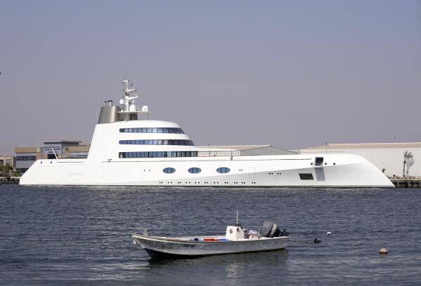 The 118-meter (387-foot) Motor Yacht A belonging to  Russian oligarch Andrey Melnichenko is anchored in the port of Ras al-Khaimah, United Arab Emirates, Tuesday, May 31, 2022. In the dusty, northern-most sheikhdom of the United Arab Emirates, Motor Yacht A, one of the world's largest yachts, sits in the quiet port — so far avoiding the fate of other luxury vessels linked to sanctioned Russian oligarchs. (AP Photo/Kamran Jebreili)