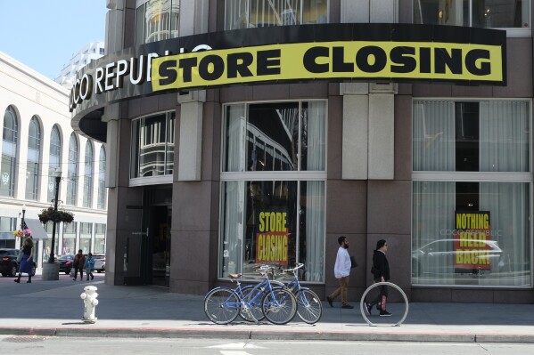 A store-closing banner hangs over the entrance to the Coco Republic store near Union Square in San Francisco on June 21, 2023. San Francisco's downtown has seen an exodus of retailers and now a shopping mall owner is turning it over to its lender in the face of declining foot traffic and empty office space. While San Francisco faces some of its own unique issues the problems serve as warning signs for other downtowns across the country, which are also feeling some pain. (AP Photo/Eric Risberg)