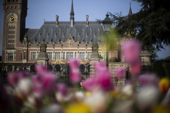 Tulips flower outside the Peace Palace housing the World Court, or International Court of Justice, in The Hague, Netherlands, Wednesday, May 1, 2024. Mexico is taking Ecuador to the United Nations' top court on Tuesday accusing the nation of violating international law by storming into the Mexican embassy in Quito on April 5 and arresting former Ecuador Vice President Jorge Glas, who had been holed up there seeking asylum in Mexico. (AP Photo/Peter Dejong)