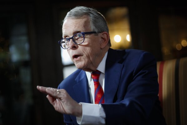 FILE - In this Dec. 13, 2019, file photo, Ohio Gov. Mike DeWine speaks during an interview at the Governor's Residence in Columbus, Ohio. DeWine tests positive for coronavirus, Friday, Aug. 6, 2020,  ahead of planned meeting with President Donald Trump. (AP Photo/John Minchillo, File)