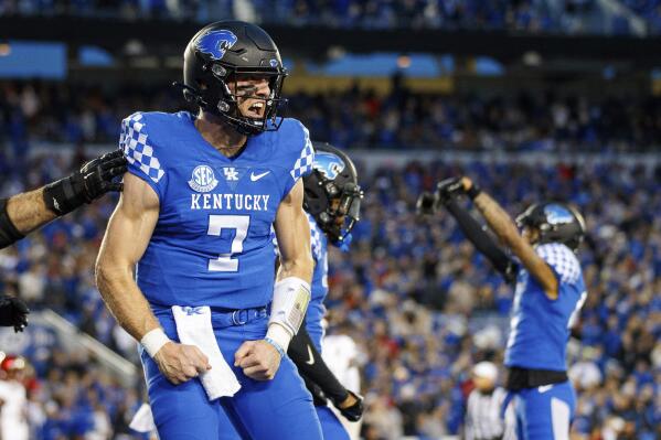 Kentucky quarterback Will Levis celebrates after throwing a touchdown pass against Louisville during the second half an NCAA college football game in Lexington, Ky., Saturday, Nov. 26, 2022. (AP Photo/Michael Clubb)