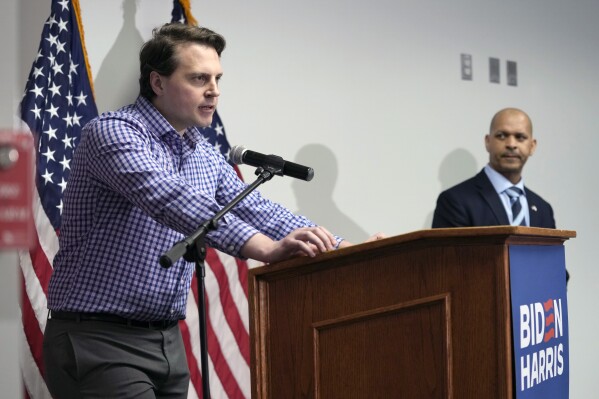 Former Capitol Police Sergeant Aquilino Gonell, right, listens as Metropolitan Police Officer Daniel Hodges speaks during a news conference in Washington, April 1, 2024. (AP Photo/Susan Walsh, File)