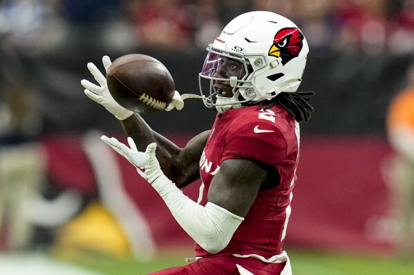 Arizona Cardinals wide receiver Marquise Brown (2) makes the catch against the Dallas Cowboys during the second half of an NFL football game, Sunday, Sept. 24, 2023, in Glendale, Ariz. (AP Photo/Ross D. Franklin)