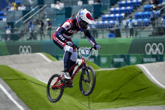 FILE - Alise Willoughby of the United States competes in the women's BMX Racing quarterfinals at the 2020 Summer Olympics, Thursday, July 29, 2021, in Tokyo, Japan. The BMX racing world championships are this weekend in Rock Hill, South Carolina, and there are spots on the American team for the Paris Olympics riding on the outcome. Willoughby, a two-time world champ and former Olympic silver medalist, is among the favorites along with U.S. teammates Felicia Stancil and Payton Ridenour. (AP Photo/Ben Curtis, File)