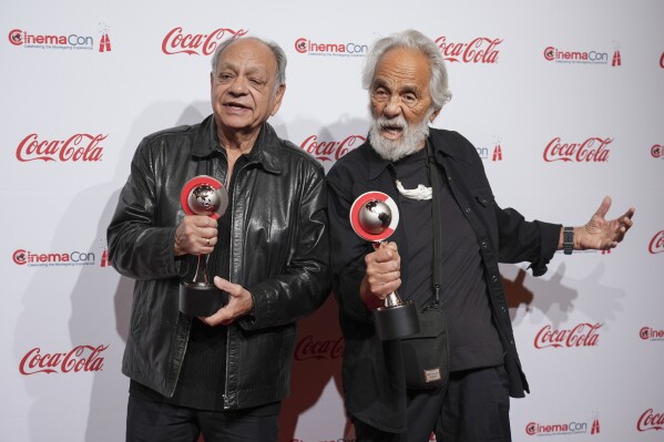 Cheech Marin, left, and Tommy Chong of Cheech & Chong pose with their career achievement in comedy award at the Big Screen Achievement Awards during CinemaCon 2024, Thursday, April 3, 2025, at Caesars Palace in Las Vegas. (AP Photo/Chris Pizzello)