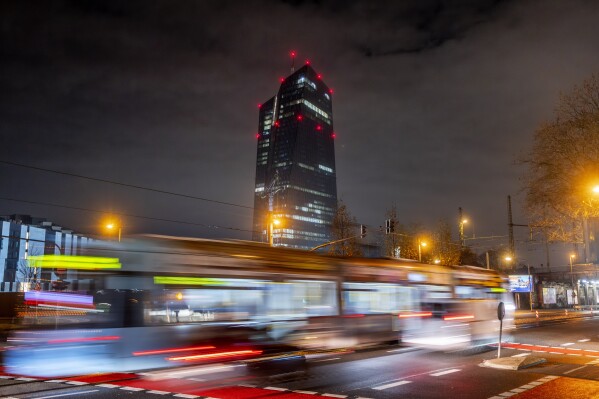 A tram passes the European Central Bank in Frankfurt, Germany, Thursday, Dec. 14, 2023. The U.S. Federal Reserve and most other major central banks spent most of the year deploying their interest-rate weapons against the worst bout of inflation in four decades. (APPhoto/Michael Probst)