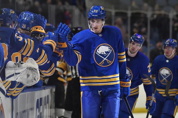 Buffalo Sabres right wing Tage Thompson celebrates after scoring against the Pittsburgh Penguins during the first period of an NHL hockey game in Buffalo, N.Y., Wednesday, March 23, 2022. (AP Photo/Adrian Kraus)