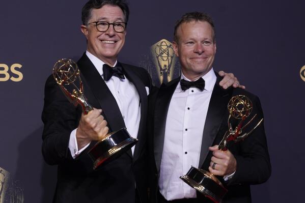 FILE - Stephen Colbert, left, and Chris Licht, winners of the award for outstanding variety special (live) for "Stephen Colbert's Election Night 2020: Democracy's Last Stand Building Back America Great Again Better 2020" attend the 73rd Primetime Emmy Awards on Sept. 19, 2021, in Los Angeles. Licht was appointed Monday as the new head of CNN, where he's expected to take over in May. (AP Photo/Chris Pizzello, File)
